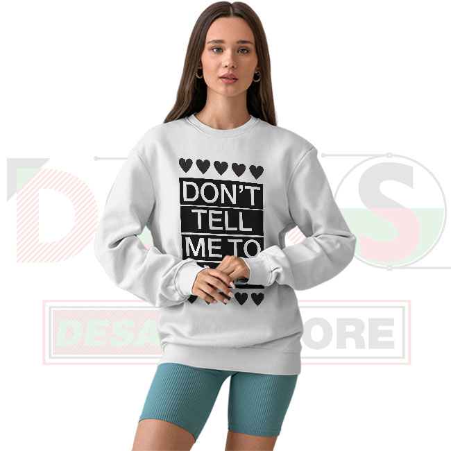 Don’t Tell Me To Smile sweatshirt with bold quote graphic